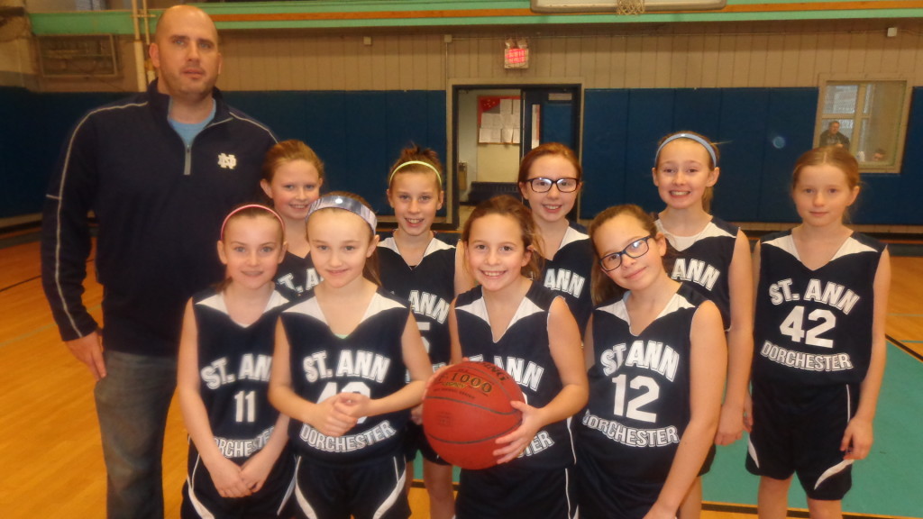 Pictured is the Saint Ann’s of Dorchester fifth and sixth grade travel basketball team coached by Danny Griffin, who is also one of Boston’s finest, a Boston Police Department officer who serves and protects all of us.