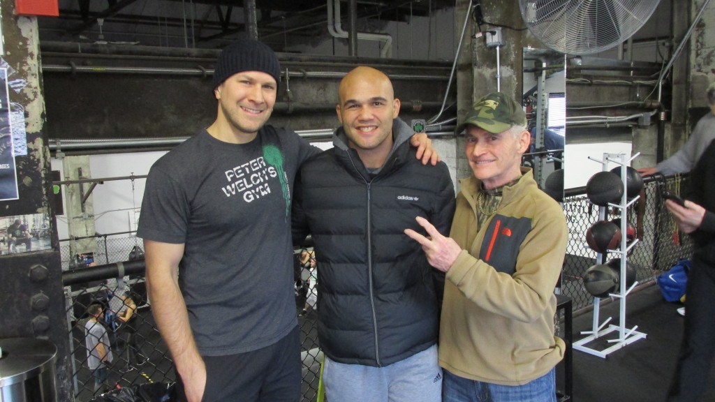 Nick, Robbie Lawlor (UFC Welterweight Champ), and Tommy C. pose at Peter Welch’s Gym this weekend.