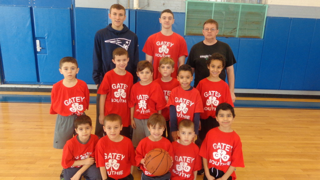 Pictured are Gate of Heaven CYO volunteers Mike Bolstad, Chris DiMaggio and Commissioner Sean Monahan. The Red all-stars are Dimitri Markos, Max Atchue, Robert Cabral, Finn Cawley, Liam Colton, Gerard DeRocher, Diego Fuentes, Trace McFarland, Nicholas Miani, Trey Miller, Thomas Quinlan, Ray Polena and Kyle Greeley.