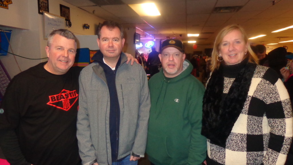 Joe Kelly (from left), John Lydon, Bobby Higgins, and Kathy Davis helped out with the raffle drive.