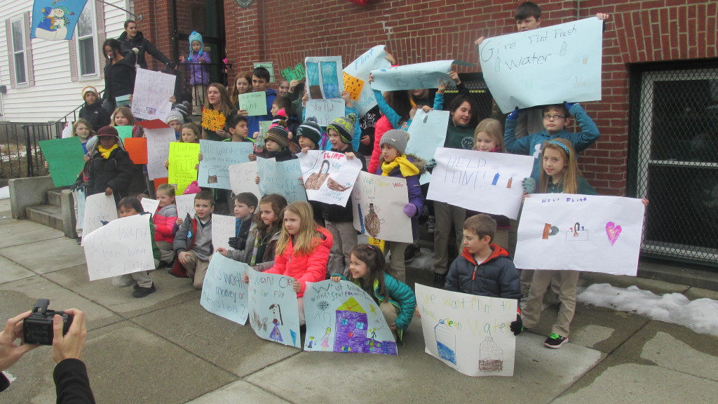 St. Peter Academy students gather with their signs for the march on Friday, Jan. 29, 2016. (Photo by Rick WInterson)