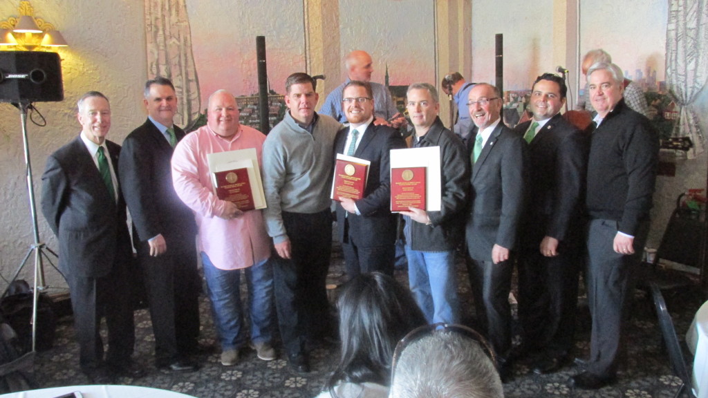 Mayor Marty Walsh congratulates three Unsung Heroes – Kevin Kelly, Ken Ryan, Jr., and John Hogan – standing with Steve Lynch, Tom McGrath, Bill Linehan, Nick Collins, and Michael Flaherty.