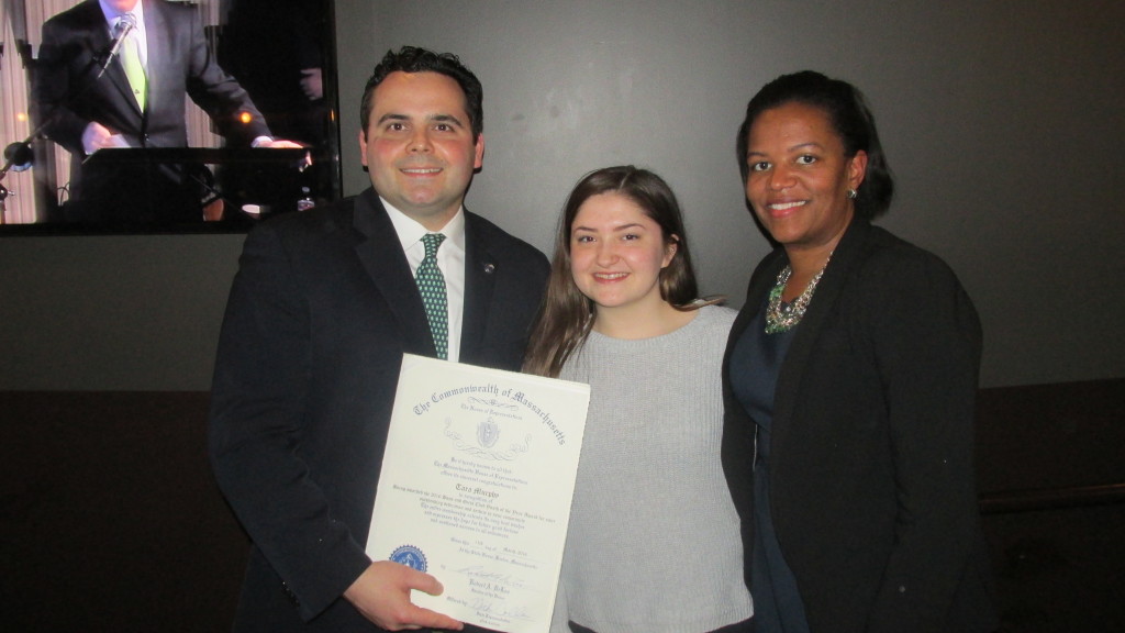 Tara Murphy receives her Youth of the Year Award from the Massachusetts House, presented to her by Rep. Nick Collins and Sen. Linda Dorcena-Forry.
