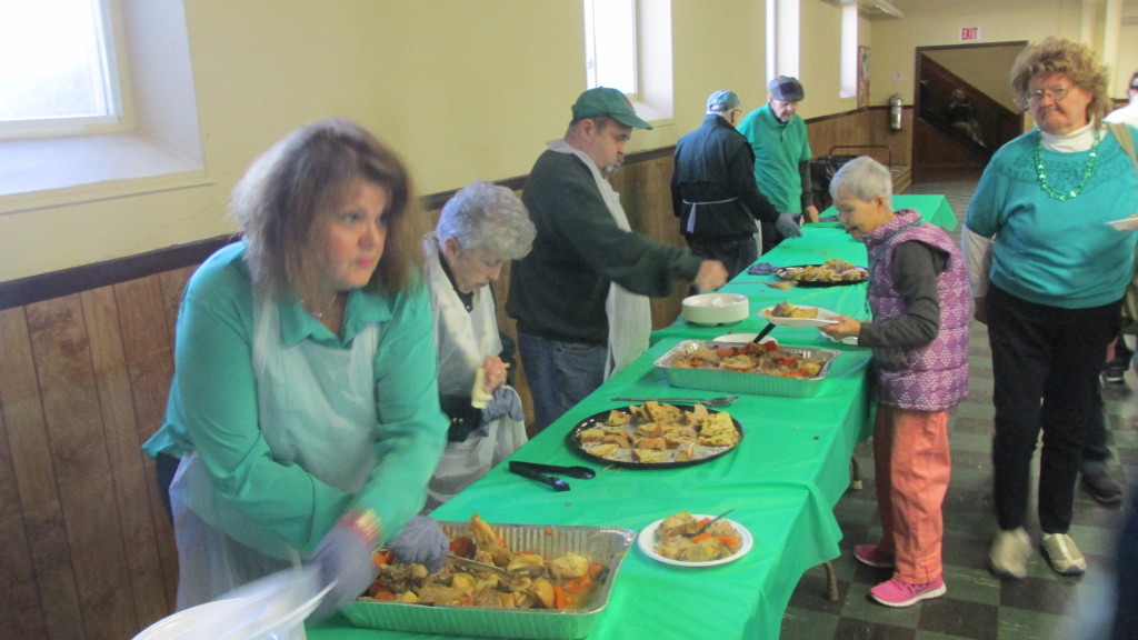 The busy (and all-volunteer) serving table at the Senior Salute.