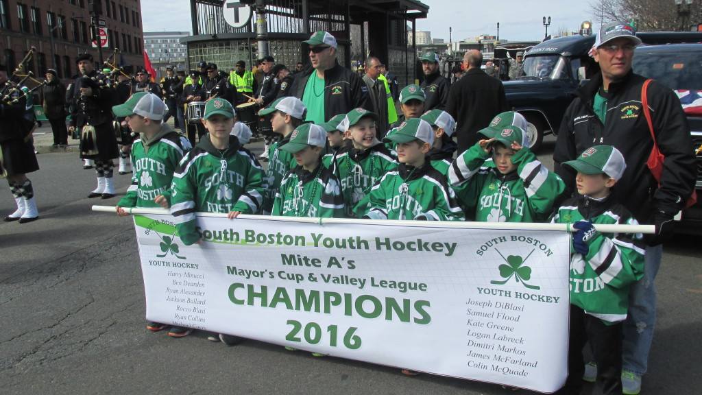 The hockey team marched in the St. Patrick's Day parade on Sunday, March 20, 2016. (Photo by Rick Winterson)