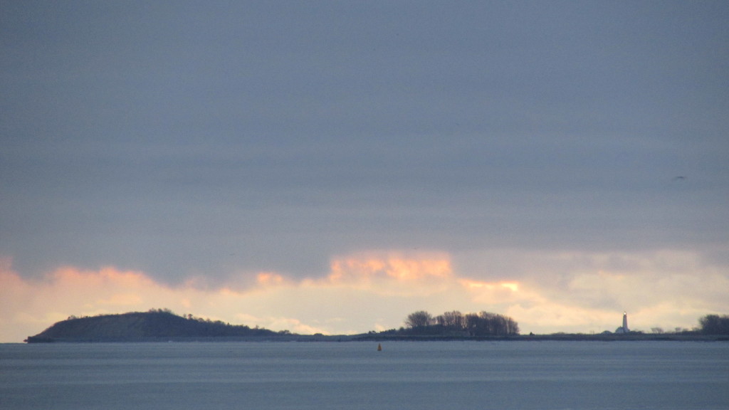 Sunrise breaks through a stratus cloud layer northeast of Castle Island on Sunday, March 27. 