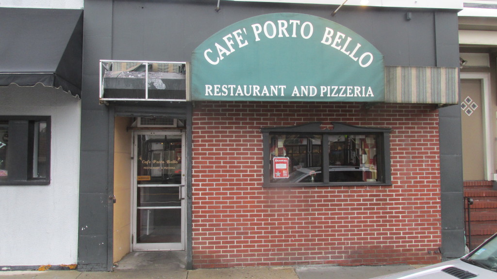 Café Porto Bello, the iconic trattoria at 672 East Broadway, sports a well-deserved “Best of Boston” 2015 award in its window. (Photo by Rick Winterson)