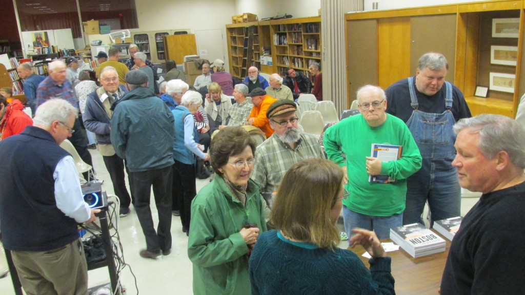 It was a full house at the library for Jim Botticelli’s “Dirty Old Boston” (lower right). He was engaged in question and answer sessions as he signed books.