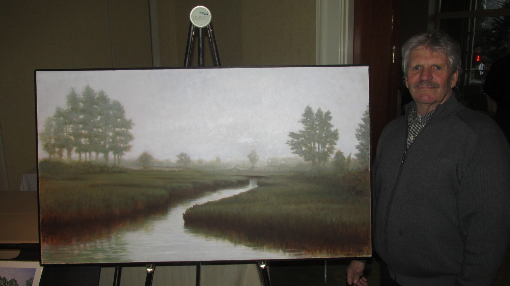 A striking oil, “Misty Marsh” by Norm Crump, graces the 2016 Taste of South Boston. Norm now has his studio/gallery on Tremont Street.