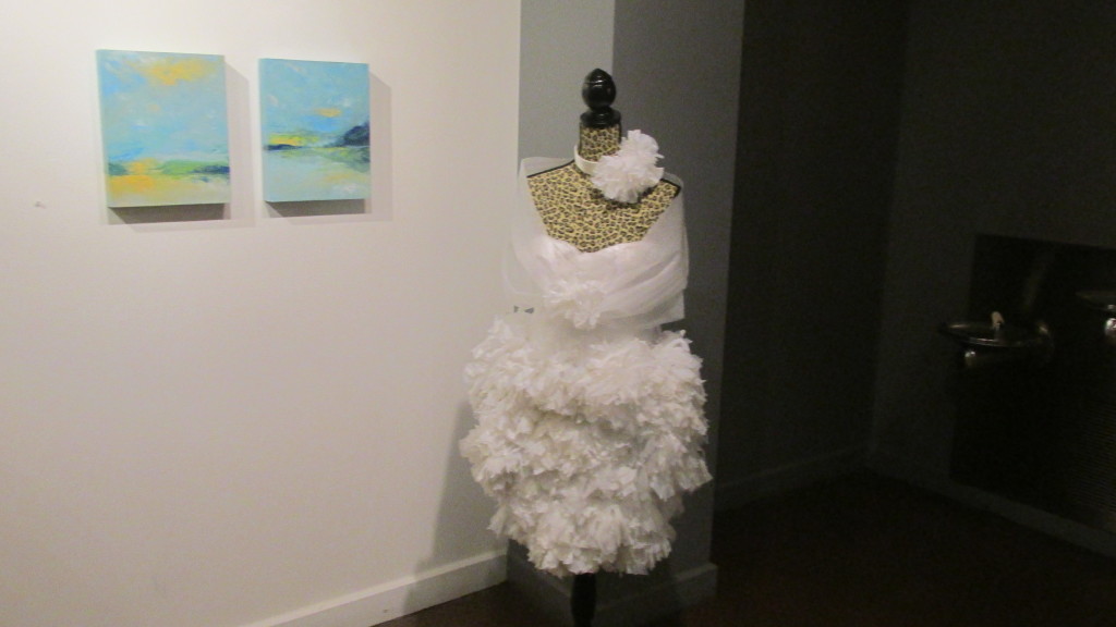 A dress completely designed and fabricated using recyclable materials.