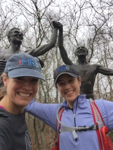 Team MR8 runners Jesse Kelly and Vicky during a training run this year by the Johnny Kelley Statue on Heartbreak Hill. (Courtesy of Vicky Shen)