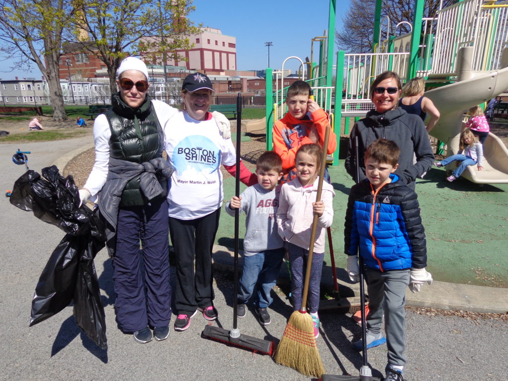 Joanne McDevitt (left) is pictured with Boston Shines volunteers at the Medal of Honor Park. (Photo by Kevin Devlin)