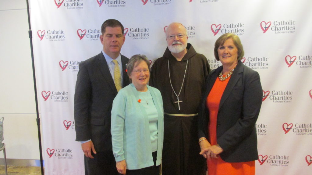 Mayor Martin J. Walsh, Sr. Maryadele Robinson, Cardinal Sean O’Malley, and Deborah Rambo, president of Catholic Charities. (Photo by Rick Winterson)