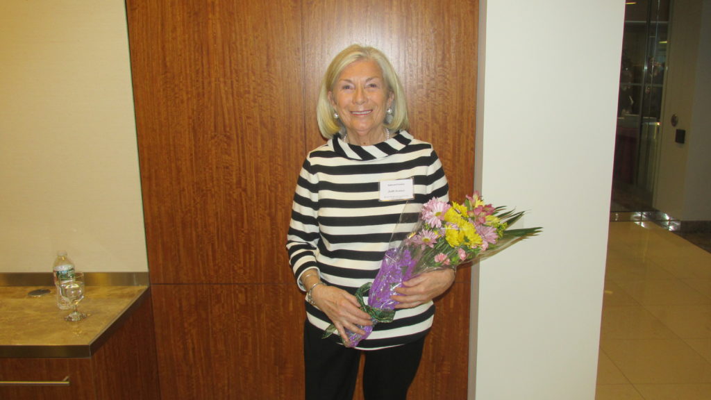 Judy Swanson, the unsung heroine of the Laboure Spring Reception, with her bouquet. (Photo by Rick Winterson)