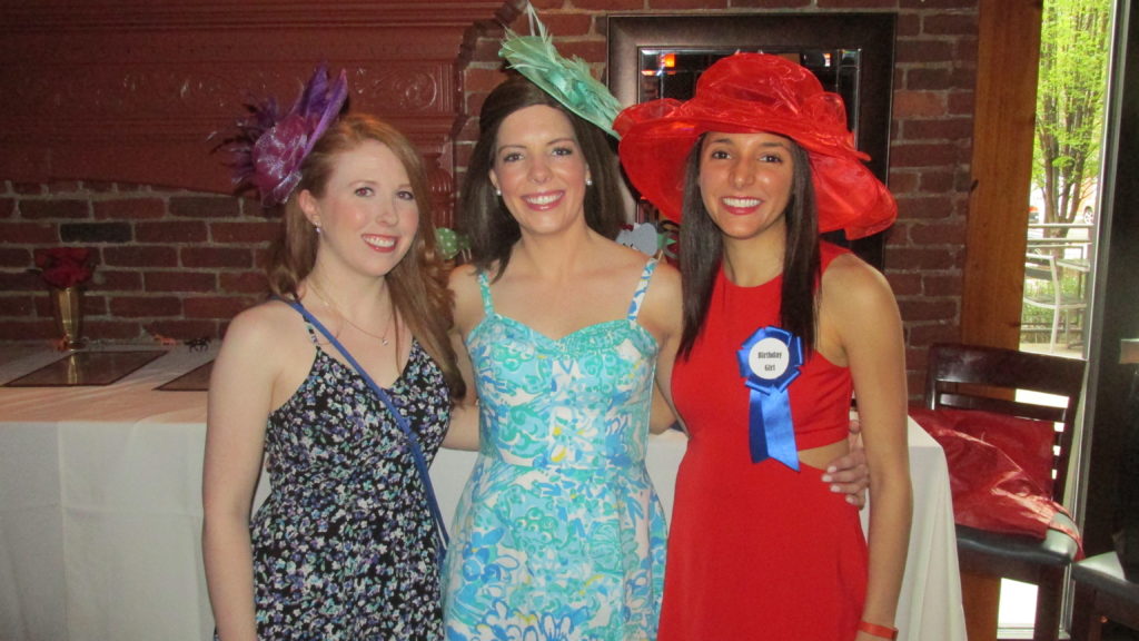 Of course the ladies dress up for the South Boston Collaborative Center’s Derby Day – wouldn’t you? (Photo by Rick Winterson)