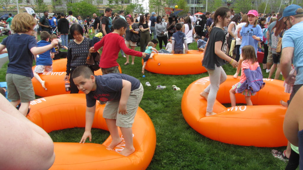 The bright orange on the tubes reflects the excitement of the kids on the Lawn on D. (Photos by Rick Winterson)