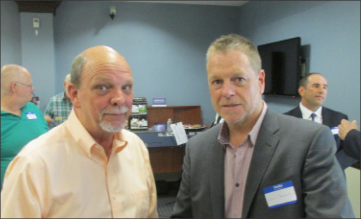 Don Wilson from the Convention Center and Jon Cronin of the Cronin Group, are enjoying the South Boston Eastern Bank Branch’s Reception. 