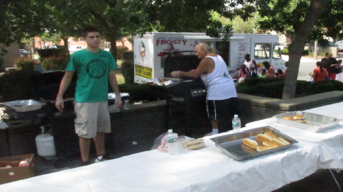 The bustling, open air kitchen and grille served countless hot dogs, hamburgers, and other goodies to the guests of the West Broadway Task Force’s 2016 Unity Day.