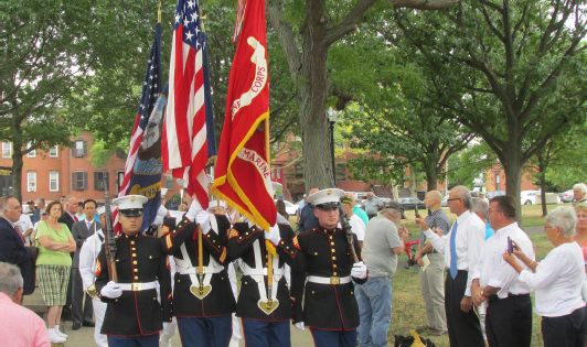 The colors are carried proudly down the walkway in Medal of Honor Park.